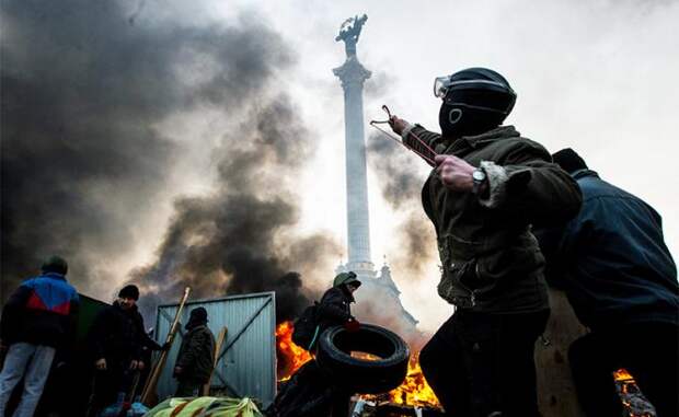 На фото: массовые беспорядки на площади Независимости в Киеве, 2014 год
