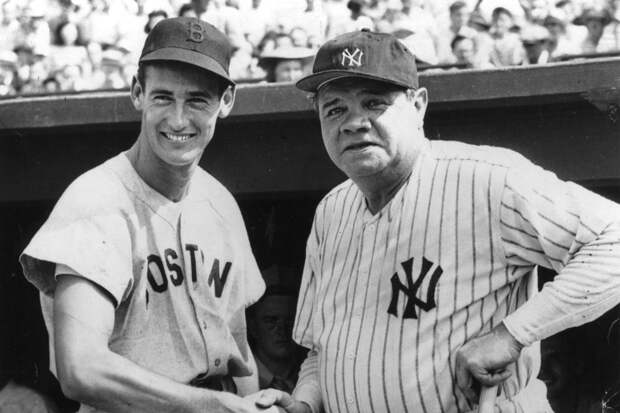 an old photo of legendary baseball players Ruth Babe and Teddy Williams shaking hands