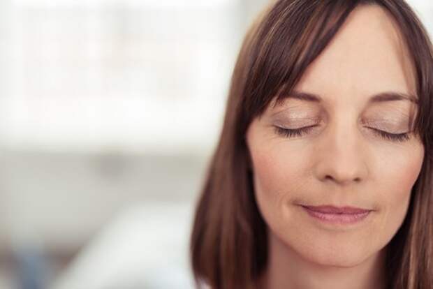 Face of a Reflective Adult Woman with Eyes Closed