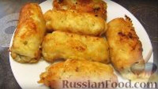 Фото к рецепту: Куриные рулетики с сыром