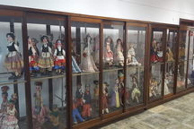 TIBBIM puppets on display at the library.