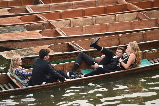 Is that a good idea? After partying the night away, guests try their hand at punting on the River Cam