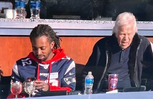 Robert Kraft sitting with Pats fan Jerry Edmond