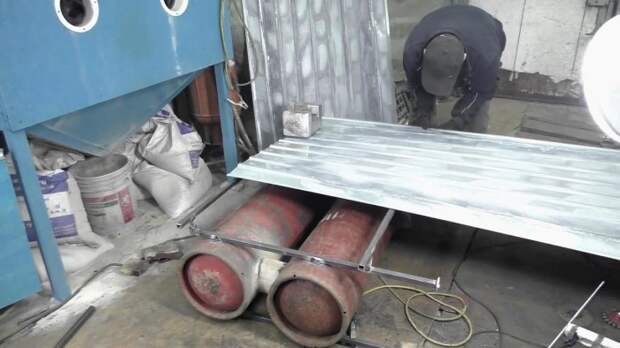 Отопительная батарея на дровах из газовых баллонов