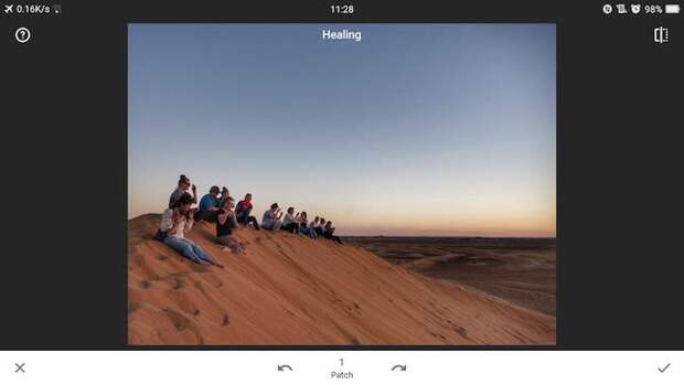 People sitting on a sand dune in Lightroom 4