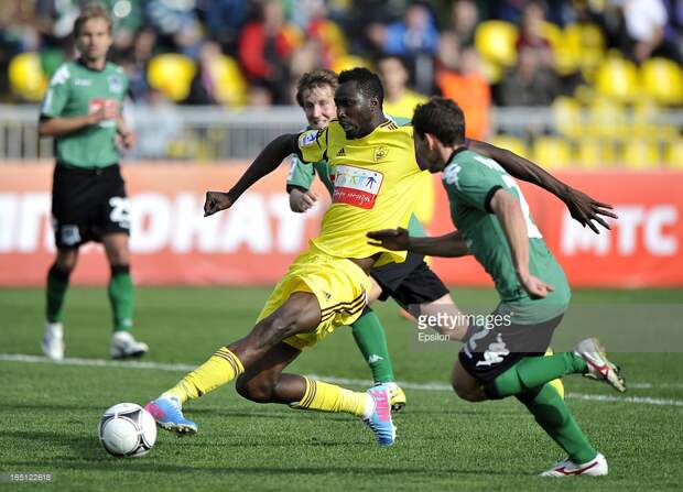 Nikolay Markov (R) of FC Krasnodar battles for the ball with Lacina Traore of FC Anzhi Makhachkala during the Russian Premier League match between FC Krasnodar and FC Anzhi Makhachkala at the Kuban Stadium on March 31, 2013 in Krasnodar, Russia.