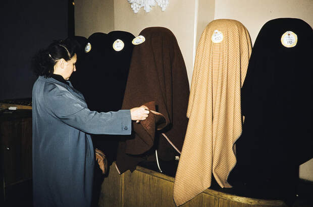 Russia, woman looking at fabric for sale at store in Moscow Russia, woman looking at fabric for sale at store in Moscow