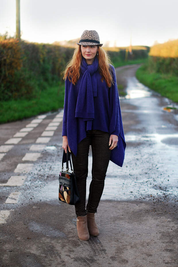 Purple poncho and leopard print hat