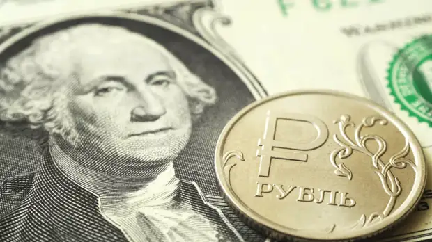 Рубль растёт к доллару и евро