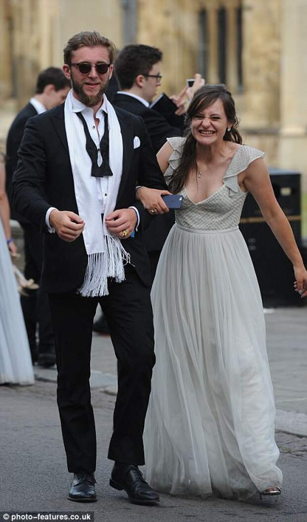 Two friends enjoy a giggle as they stumble home from the ball