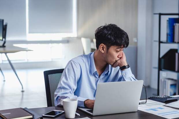 A person at a laptop.