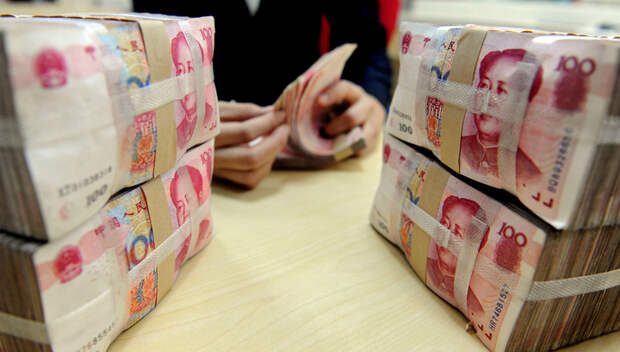 СМИ: РФ и КНР отказываются от расчетов в долларах