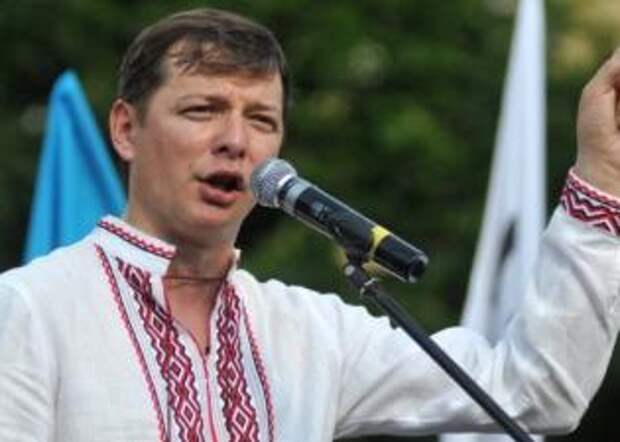 Лидера украинских радикалов Ляшко в Ивано-Франковске встретили с криками "Позор!" и забросали яйцами