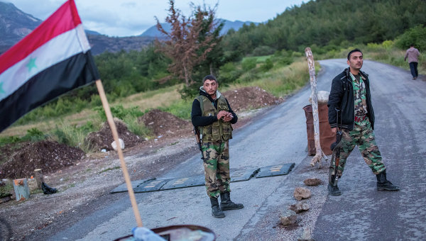 Сирийские военные на блокпосту в провинции Латакия, на границе с Турцией. Архивное фото