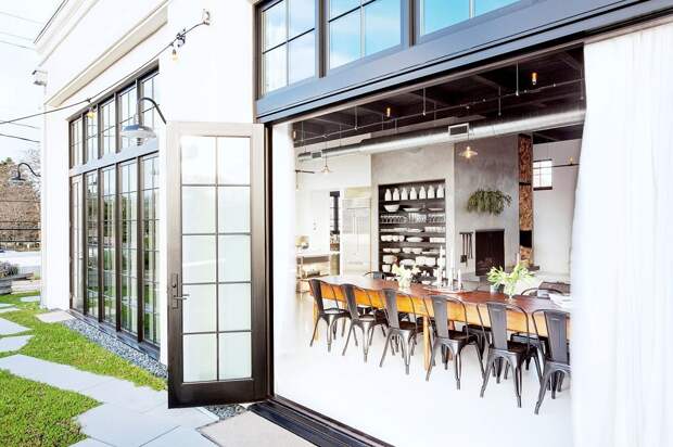 1_exterior-dining-room-view-windows-doors-portland-industrial-loft-cococozy-nyt