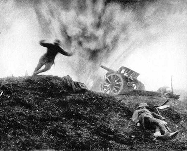 German soldier dives for cover as shell explodes behind him at an artillery position, 1917