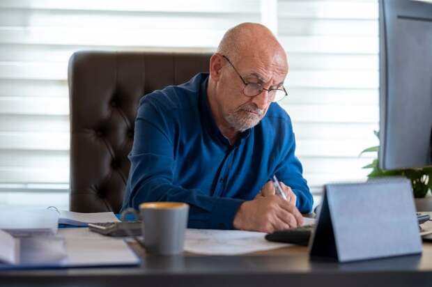 A person sitting at a desk.