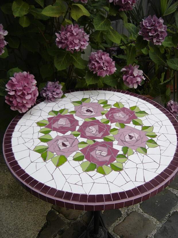 Mosaic patio table top with roses...
