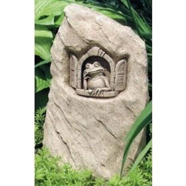 I have this little guy sit below where the water comes down from the roof to break the fall. Fits nice with the flora.