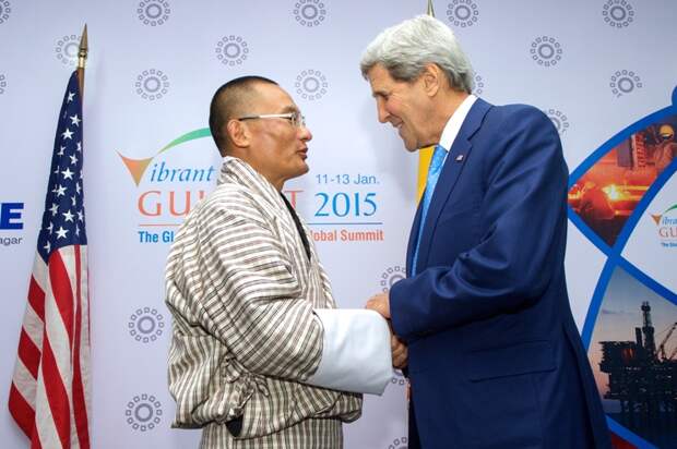 Secretary Kerry shakes hands with Bhutanese Prime Minister Tobgay 