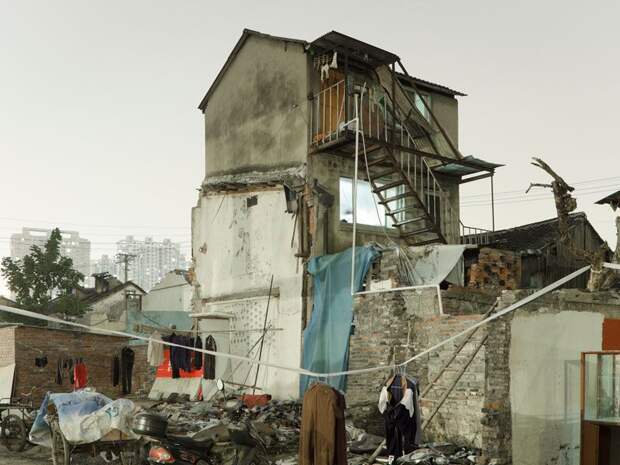 Трущобы упрямых китайцев, отказывающихся переселяться в квартиры (23 фото)