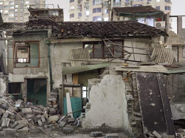 Трущобы упрямых китайцев, отказывающихся переселяться в квартиры (23 фото)