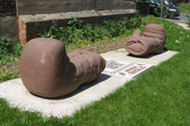 Two seats in the form of boxing gloves with Brendan's advice between.