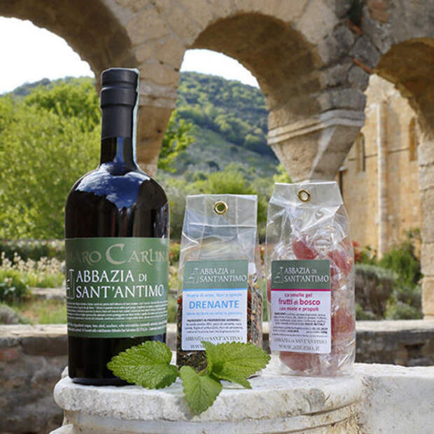 A bottle of amaro, with other monastery snacks.