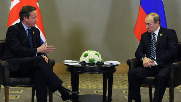 Президент России Владимир Путин и премьер-министр Соединенного Королевства Великобритании и Северной Ирландии Дэвид Кэмерон во время встречи на полях саммита Группы двадцати