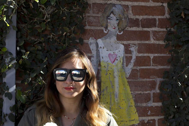yellow lady on a wall
