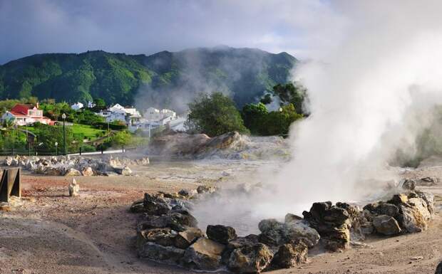 Steam rises from a hot spring in Furnas in the Azores.