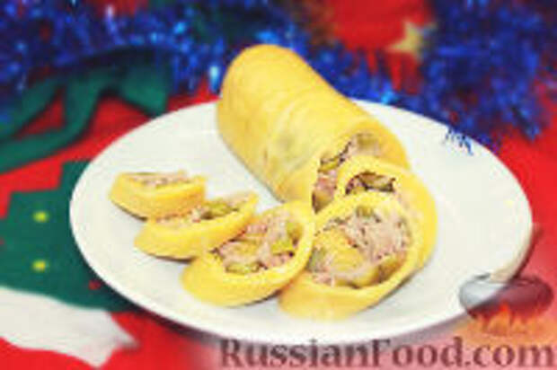 Фото к рецепту: Сырный рулет с тунцом
