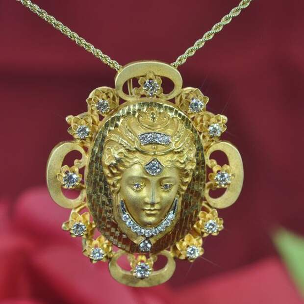 14K yellow gold Art Nouveau necklace featuring a goddess containing diamonds approximately 1.7 carats. Can be worn as a pendant and as a brooch. Weight: 28.4 gram/ 18.3 dwts
