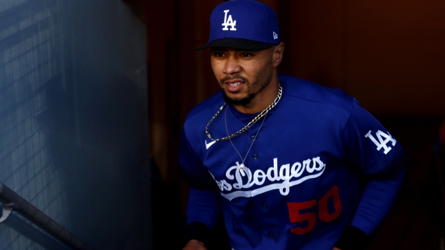 Mookie Betts runs out of the dugout.