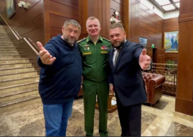 Военкоры Сладков и Поддубный встретились с Путиным и Шойгу