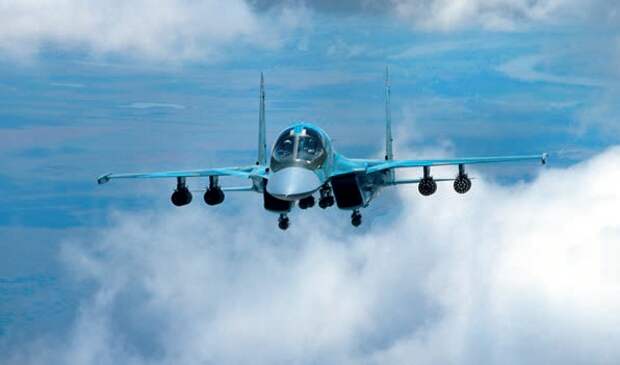 Опытный самолет Т-10В с неуправляемым вооружением — бомбами ФАБ-250 и ракетными блоками Б-8