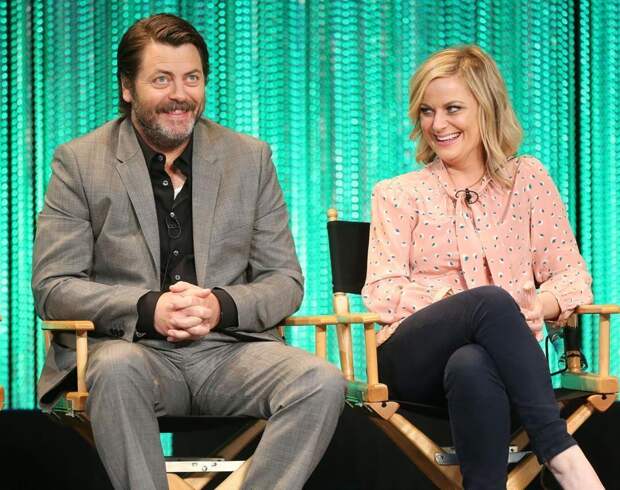 HOLLYWOOD, CA - MARCH 18: Actor Nick Offerman (L) and actress Amy Poehler speak during The Paley Center for Media's PaleyFest 2014 Honoring