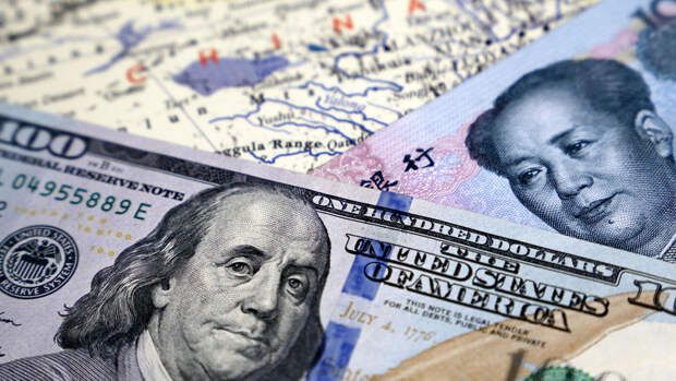 Экономист Беляев: доллар остается более предпочтительным для вложений, чем юань