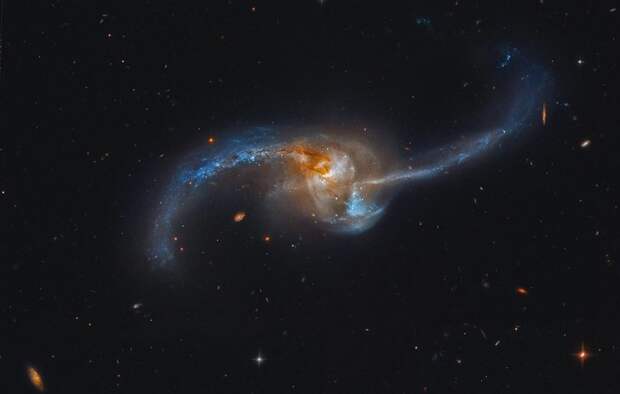Сливающаяся галактика NGC 2623 интересное, космос, красота