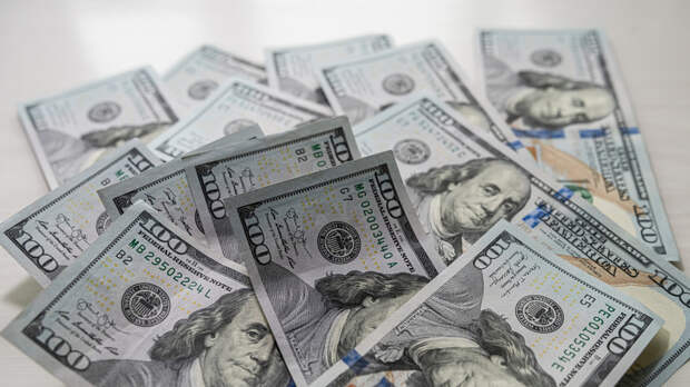 Экономист Беляев: кризис на Ближнем Востоке не угрожает доллару