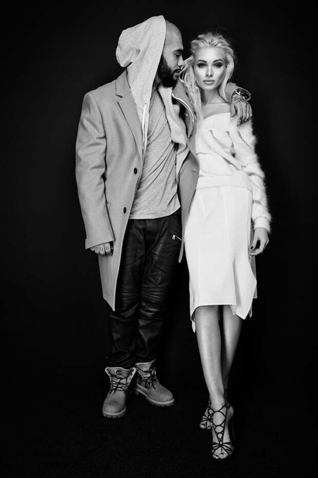 На Тимати: пальто, Pal Zilieri; худи, Acne; джинсы, Balmain; ботинки, Timberland. На Алене: джемпер, юбка, все Tom Ford; босоножки, Сasadei.