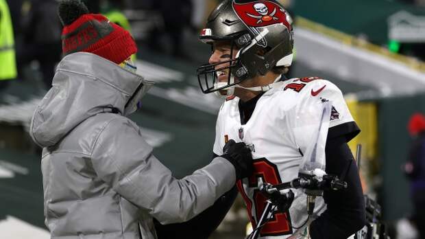 Tom Brady celebrates with his son, Jack, after a Bucs game.