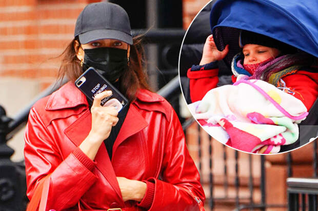 Ирина Шейк в алом кожаном плаще на прогулке с дочерью Леей: новые фото