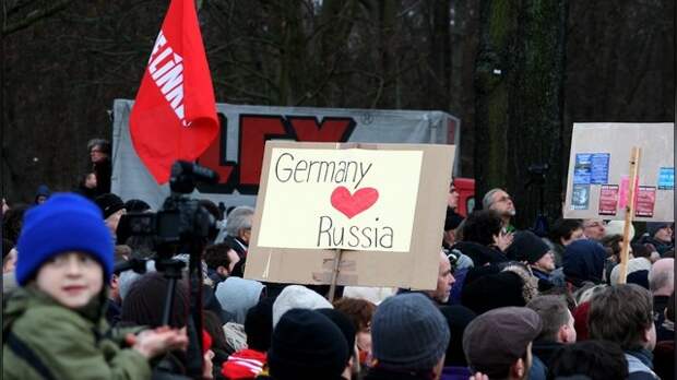 Neue Osnabrücker Zeitung: Немцы вешают в офисах портреты Путина