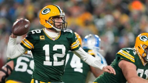 Aaron Rodgers with the football