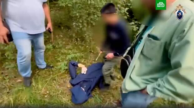 На следственном эксперименте. Фото: скрин видео НТВ.