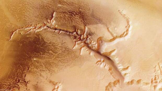 Echus Chasma is an approximately 100 km long and 10 km wide incision in the Lunae Planum high plateau north of Valles Marineris, the Grand Canyon of Mars. Images taken by ESA's Mars Express of Echus Chasma.