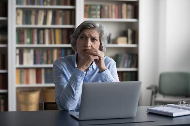 A person at a laptop.