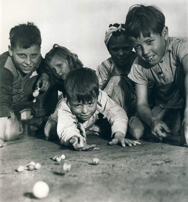 33. Игра в марблс, Миссури, 1940 год детство, прошлое, фотография