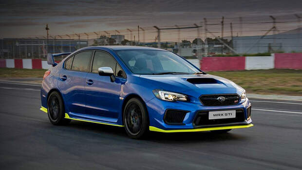 Subaru wrx sti. Использовав проставки на всех колёсах, мастера расширили колею на 20 мм. Передняя подвеска занижена на 10 мм. Новый обвес «по кругу» окрашен в тот же жёлтый колер High Viz, что и тормозные суппорты. Образ дополняют 19-дюймовые диски Y-design с шинами 245/35 R19 (на фото не они).